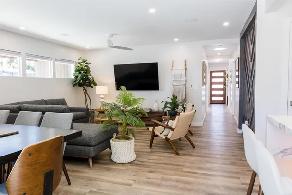 a bed room with a bed and a chair