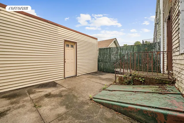 a view of a terrace with sitting area