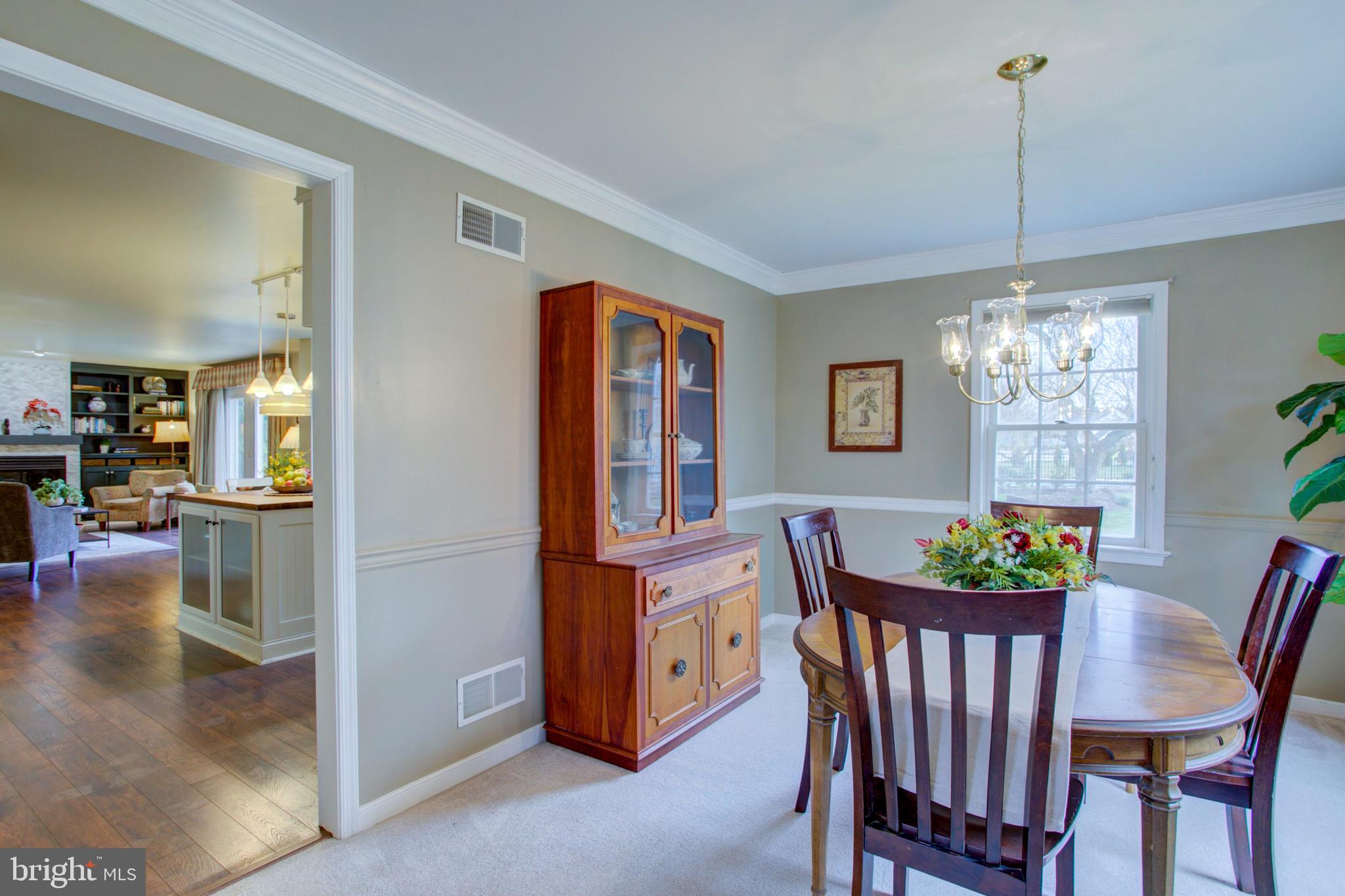 239 Kingsbridge Drive Lititz, PA 17543 - Photo 14 of 37 a view of a dining room with furniture window and wooden floor