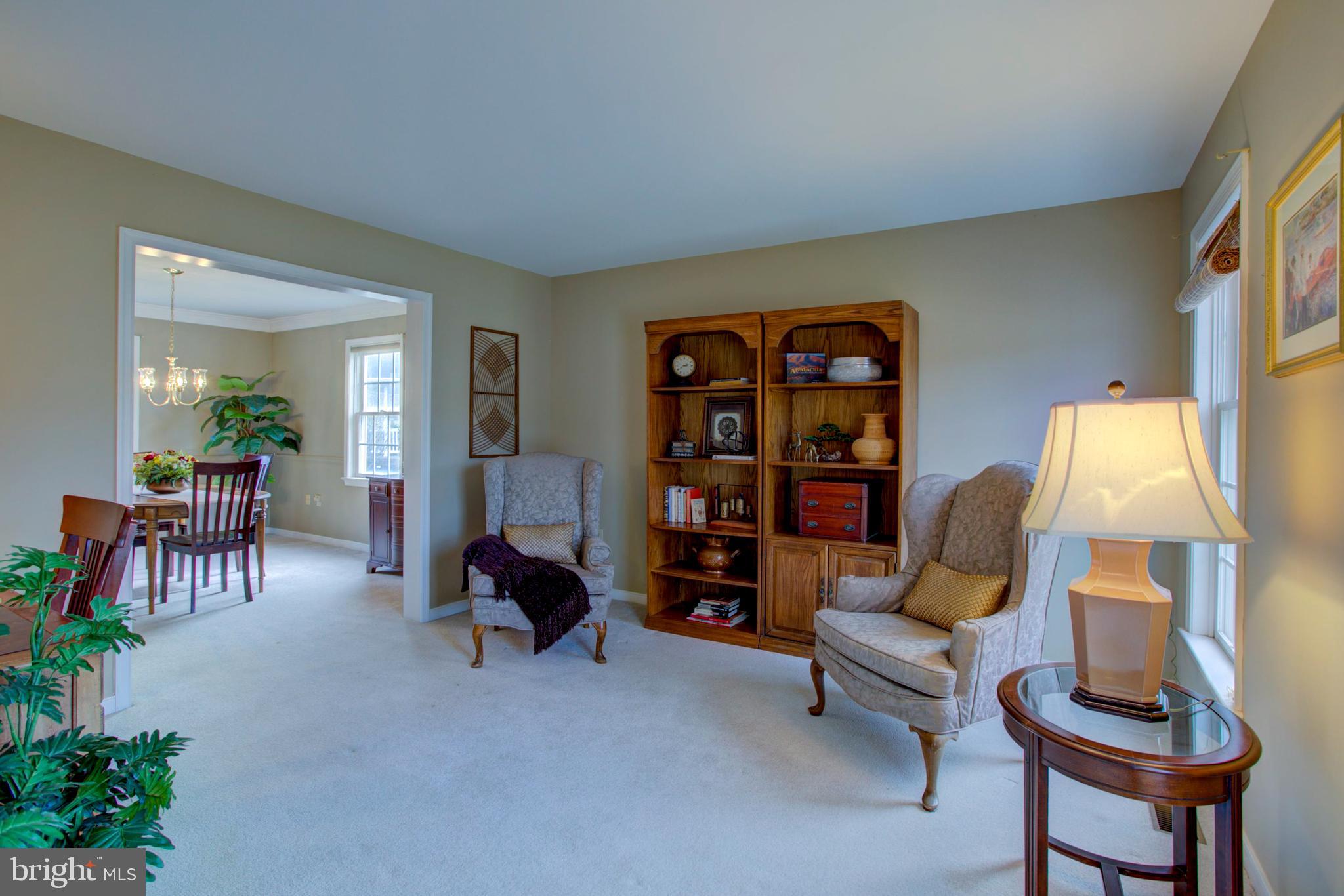 239 Kingsbridge Drive Lititz, PA 17543 - Photo 17 of 37 a living room with furniture and a lamp