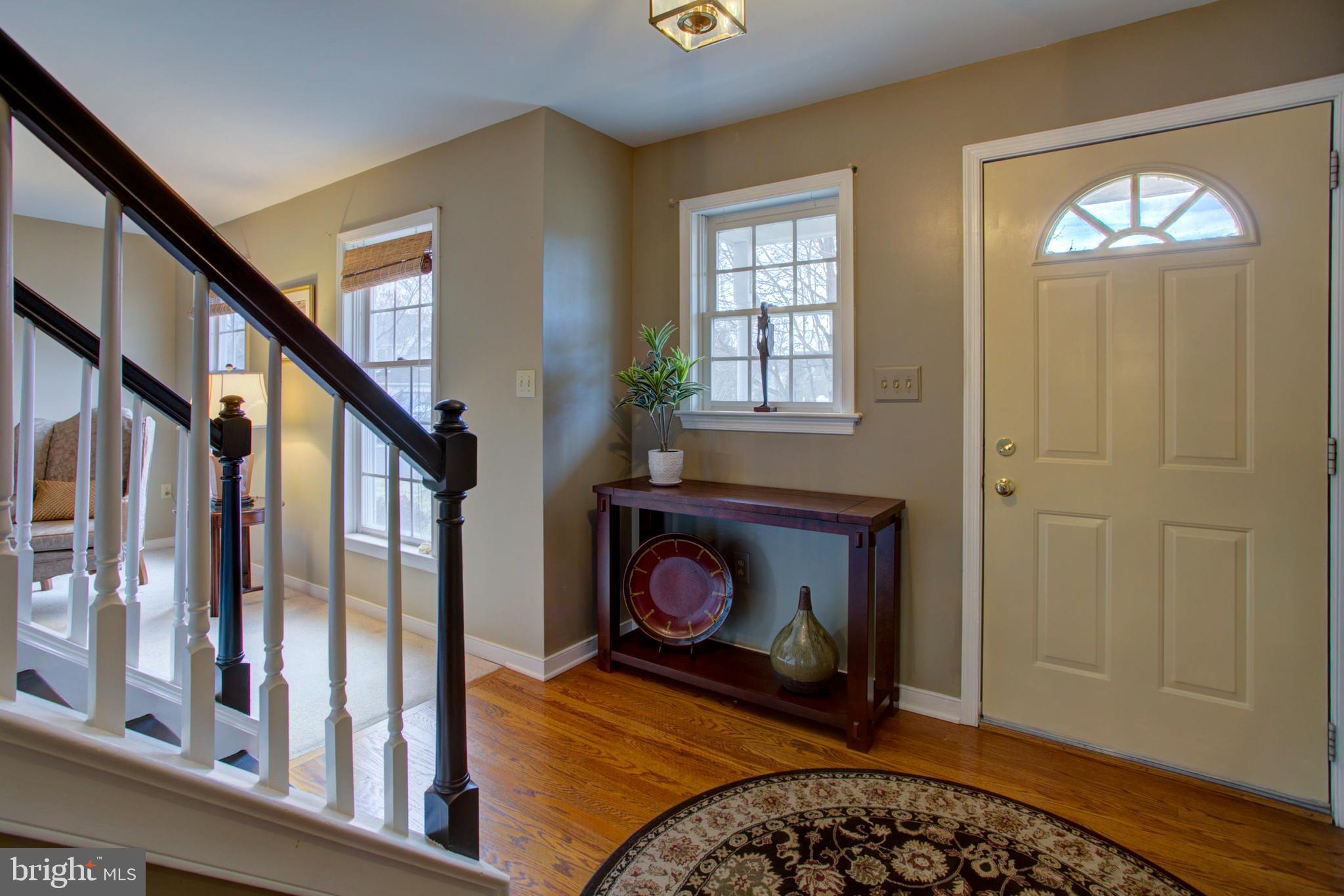 239 Kingsbridge Drive Lititz, PA 17543 - Photo 2 of 37 a living room with furniture and a fireplace