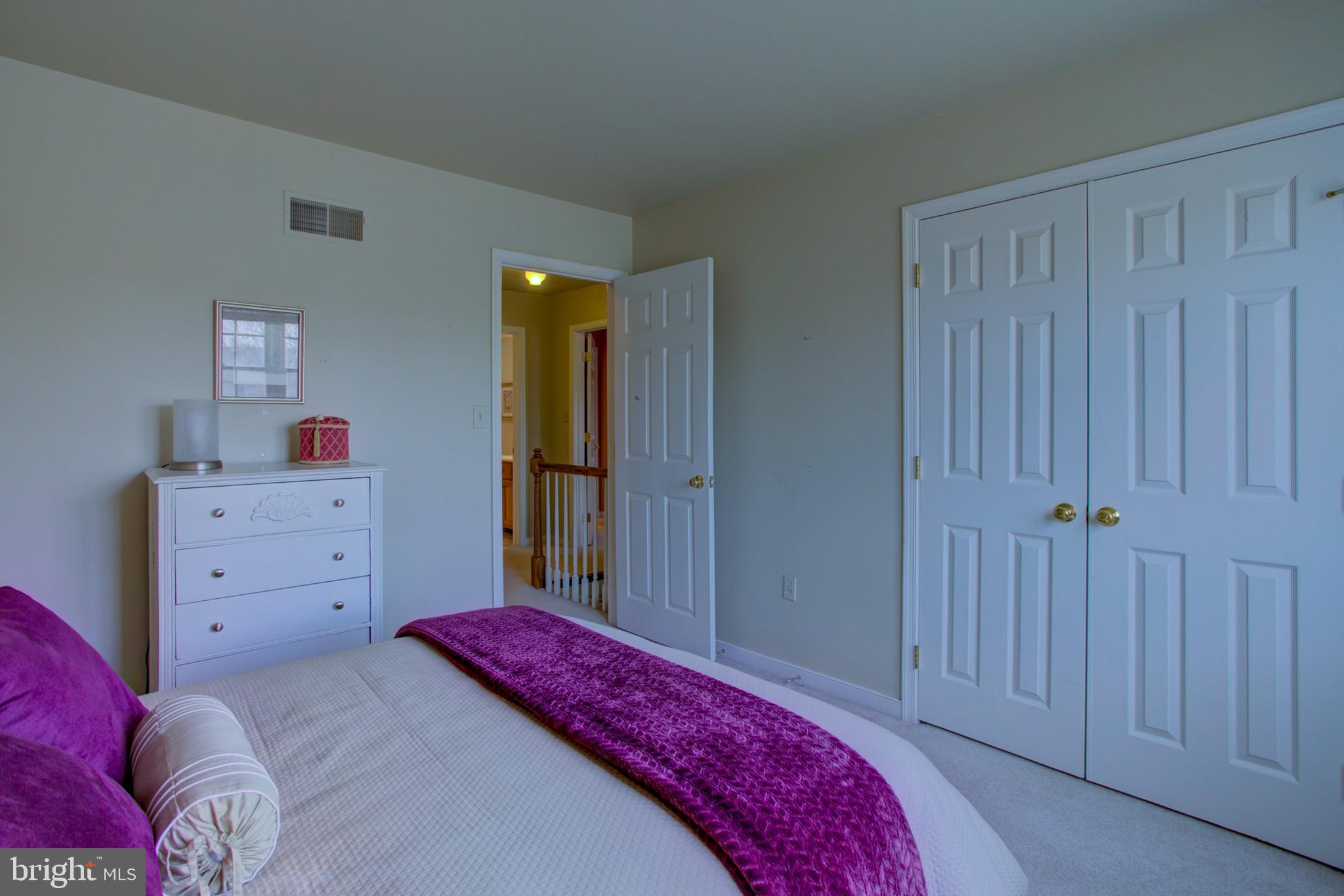 239 Kingsbridge Drive Lititz, PA 17543 - Photo 22 of 37 a bedroom with a bed and a closet
