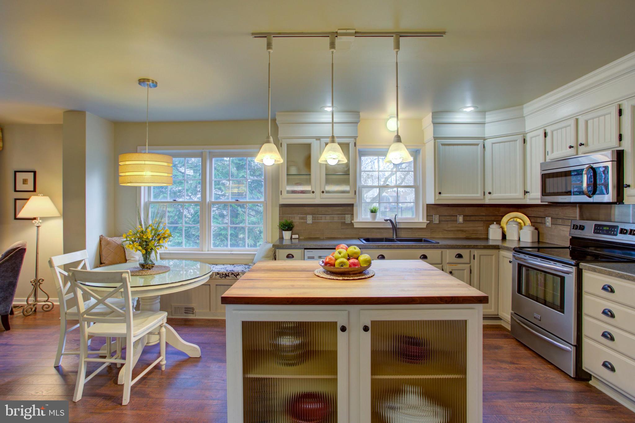 239 Kingsbridge Drive Lititz, PA 17543 - Photo 3 of 37 a kitchen with a sink cabinets and window