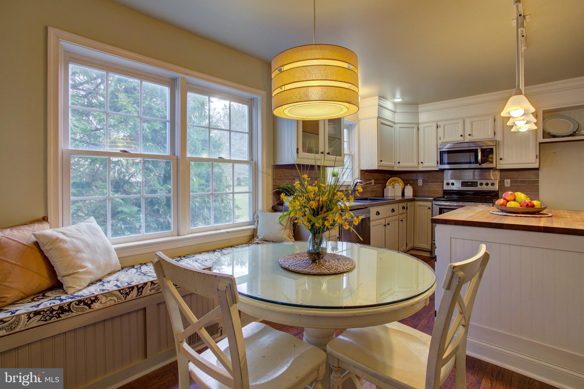239 Kingsbridge Drive Lititz, PA 17543 - Photo 8 of 37 a kitchen with a table and chairs
