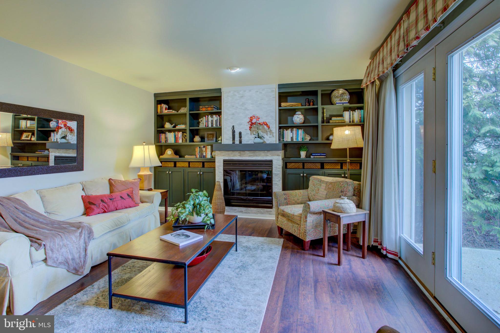 239 Kingsbridge Drive Lititz, PA 17543 - Photo 9 of 37 a living room with furniture and a fireplace