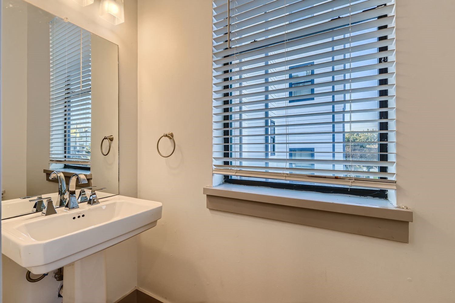 2208 Arabelle Street Houston, TX 77007 - Photo 6 of 26 a bathroom with a sink and a mirror