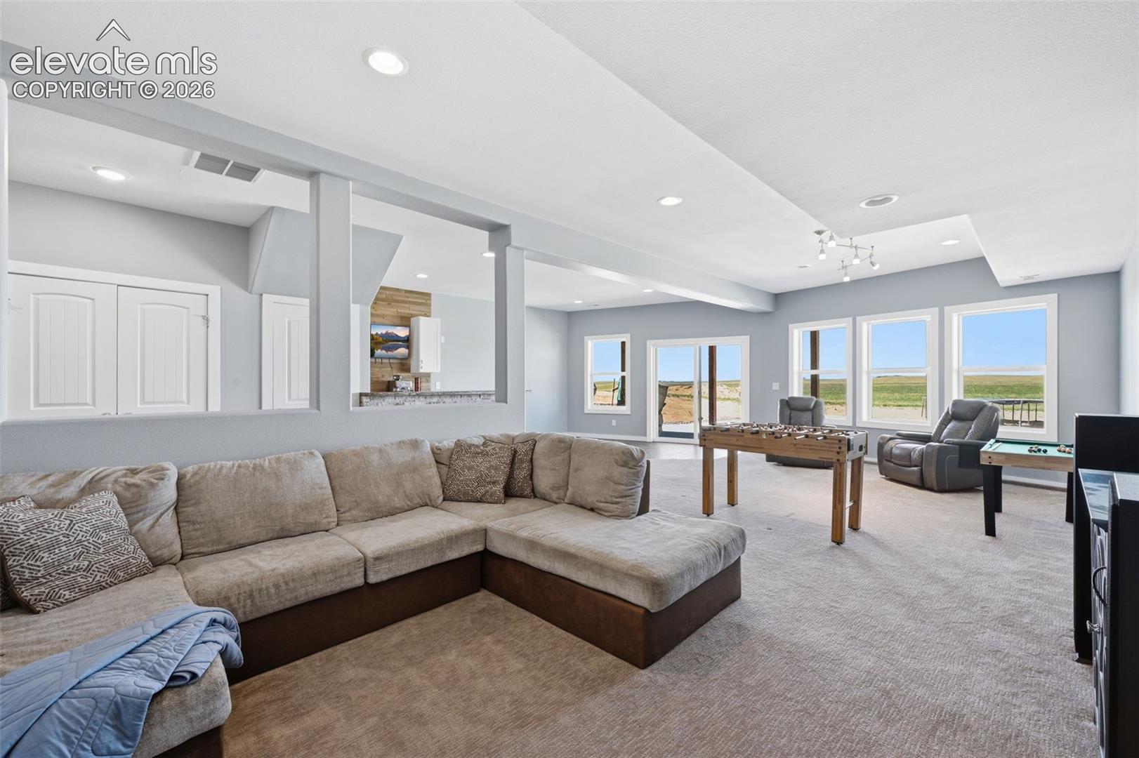 23335 Sanborn Road Calhan, CO 80808 - Photo 18 of 28 Spacious walkout basement with flexible living possibilities