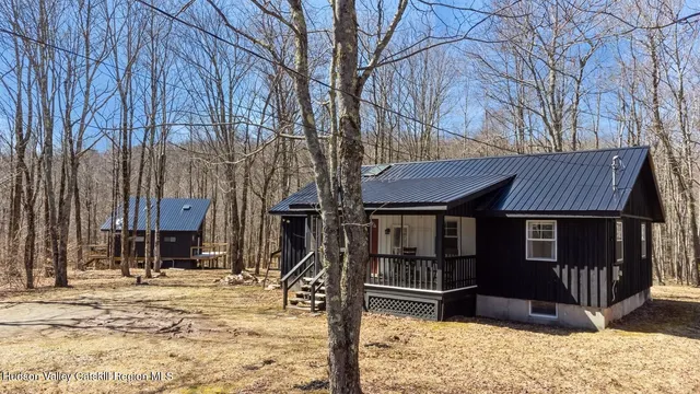 a large kitchen with a table and chairs
