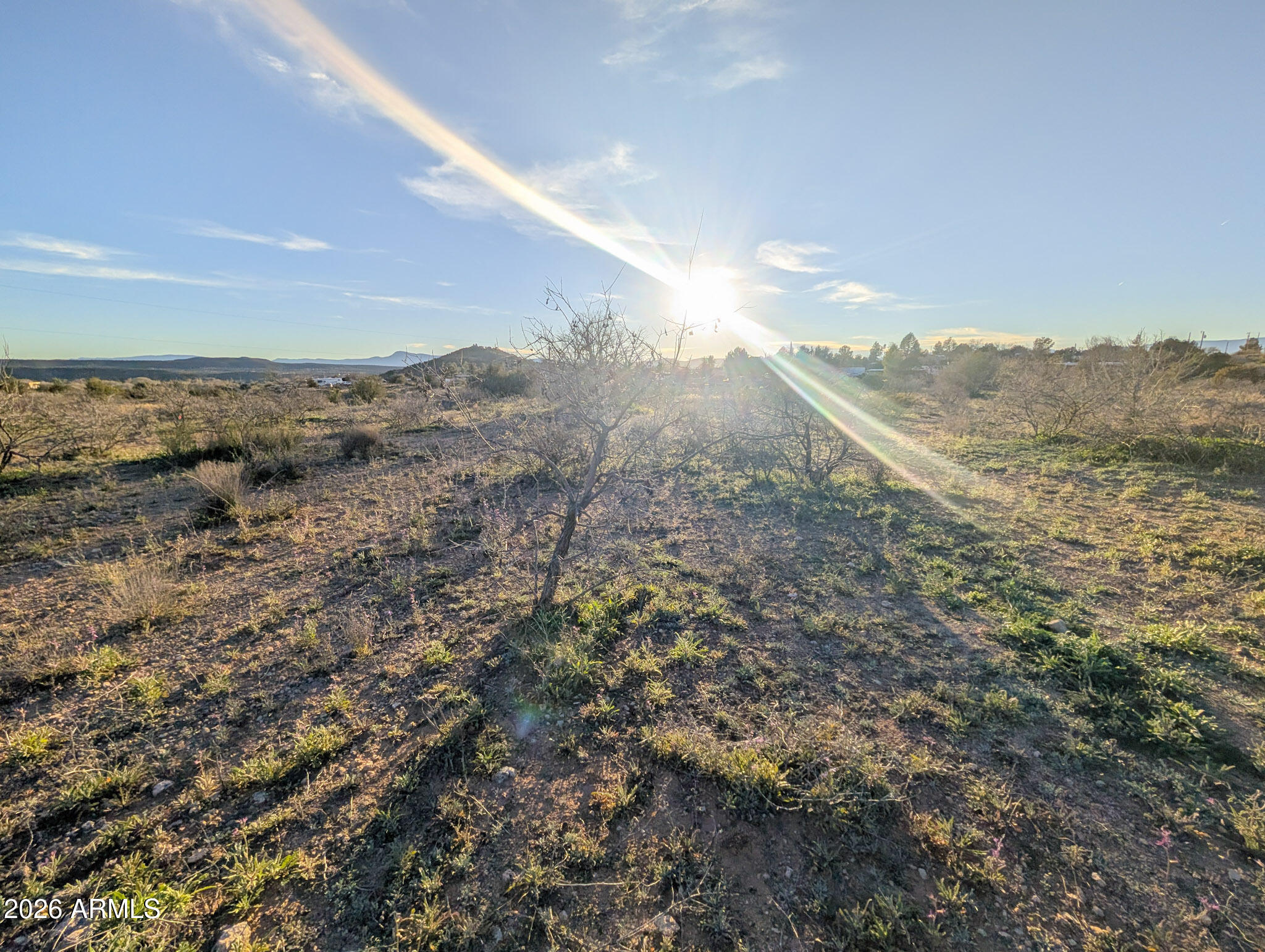 4025 East Red Baron Drive, Unit 40525757Z Rimrock, AZ 86335 - Photo 41 of 66 a view of a dry yard with mountains in the background