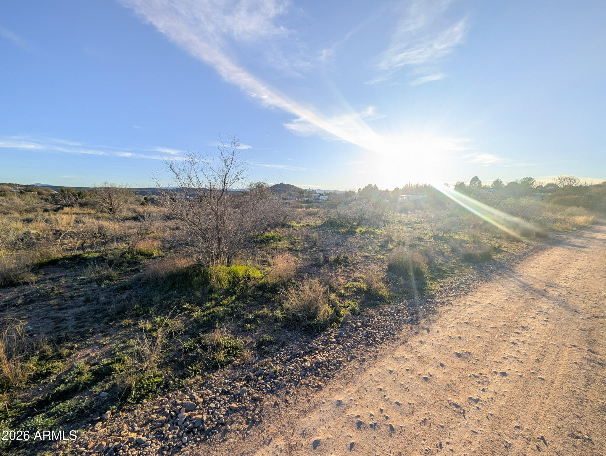 4025 East Red Baron Drive, Unit 40525757Z Rimrock, AZ 86335 - Photo 56 of 66 a view of a dry yard with mountains in the background