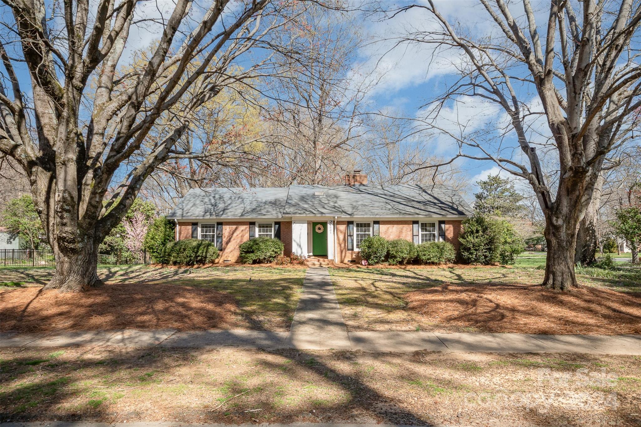 3901 Sulkirk Road Charlotte, NC 28210 - Photo 24 of 24 a house with trees in front of it