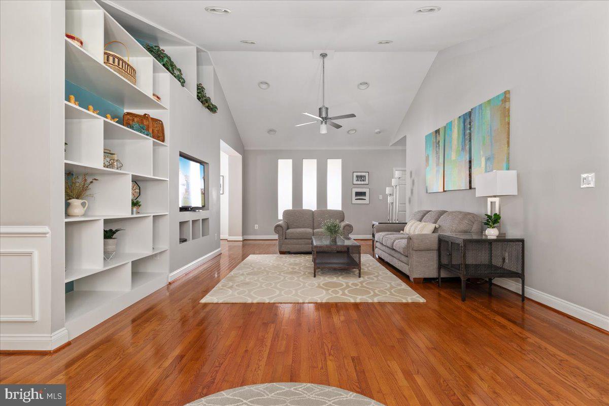 13612 Ryton Ridge Lane Gainesville, VA 20155 - Photo 16 of 83 a living room with furniture and a wooden floor