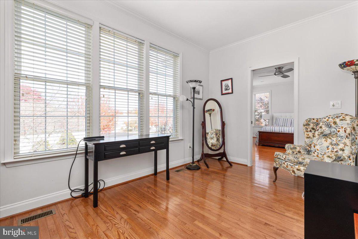 13612 Ryton Ridge Lane Gainesville, VA 20155 - Photo 23 of 83 a view of a livingroom with furniture hardwood floor and a large window