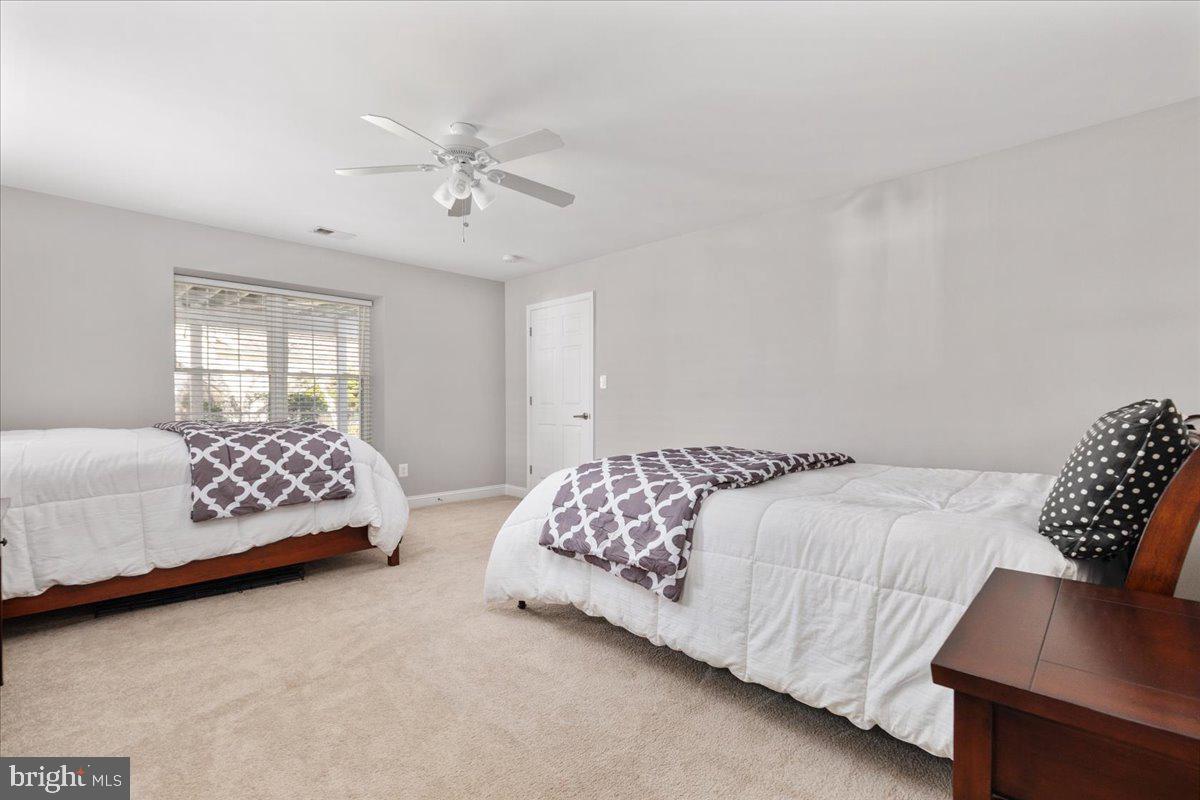 13612 Ryton Ridge Lane Gainesville, VA 20155 - Photo 44 of 83 a bedroom with a bed and window