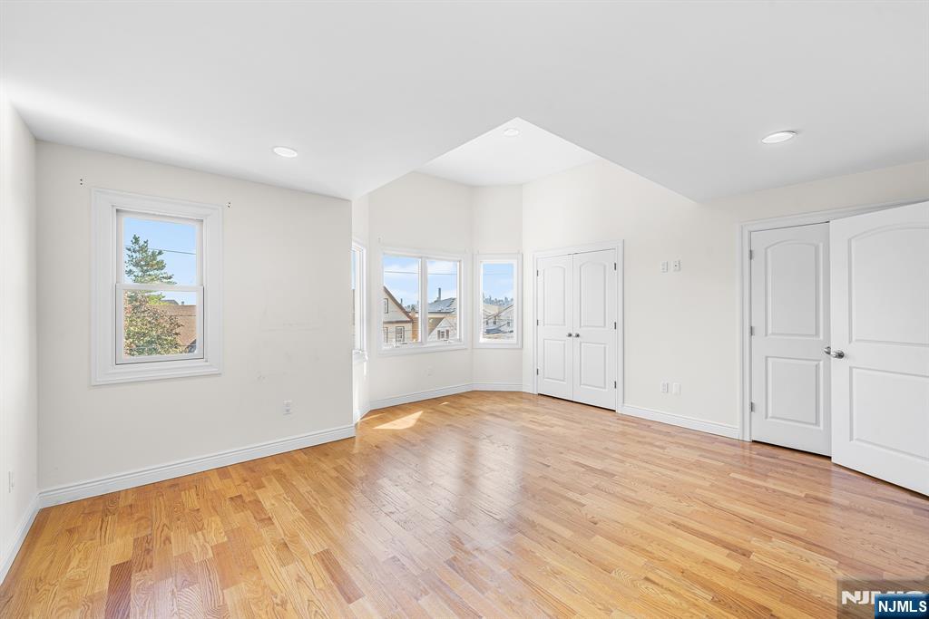 233 5th Street, Unit B Fairview, NJ 07022 - Photo 22 of 31 a view of an empty room and window