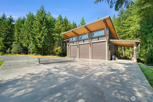 a backyard of a house with garage