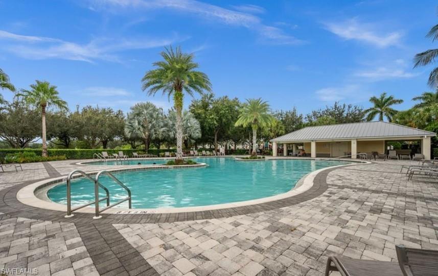 2934 Citrus Street Naples, FL 34120 - Photo 24 of 29 a view of a swimming pool with a patio