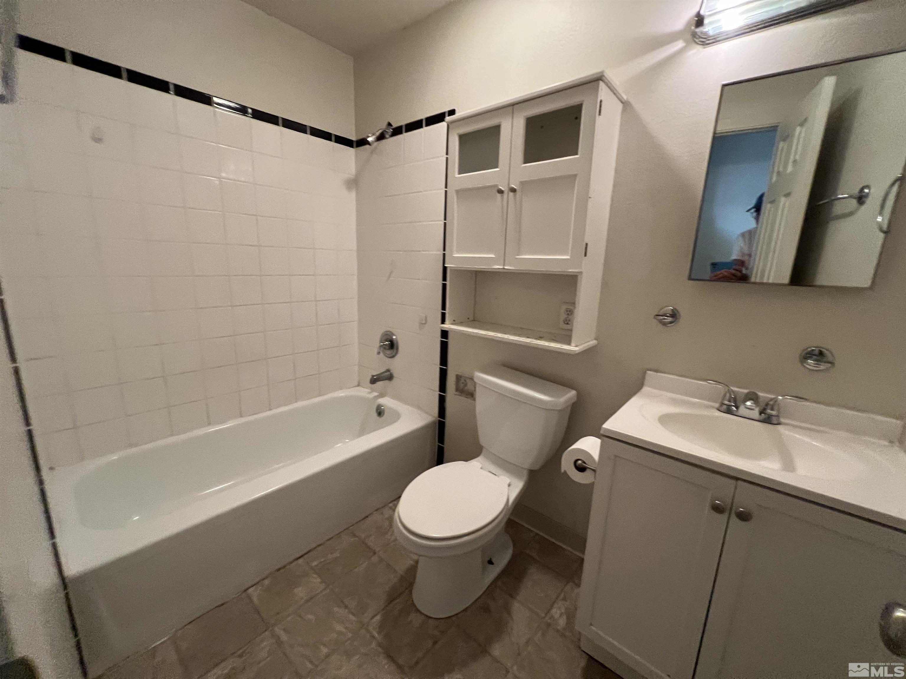 1430 Exeter Way Reno, NV 89503 - Photo 6 of 7 a bathroom with a sink toilet and shower