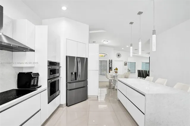 a bathroom with a sink double vanity and a mirror