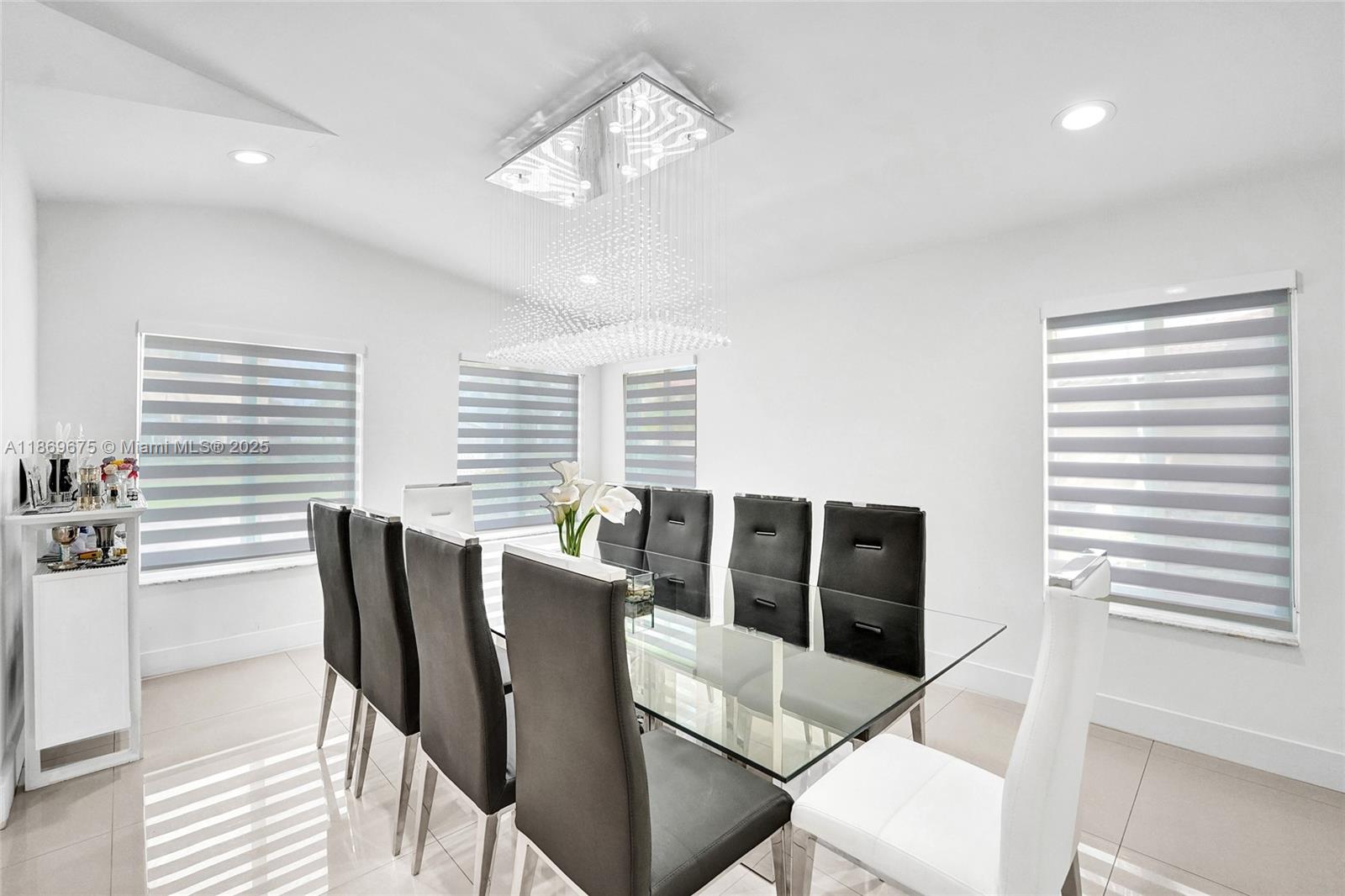 1636 Southwest 108th Terrace Davie, FL 33324 - Photo 20 of 92 a view of a dining room with furniture and windows