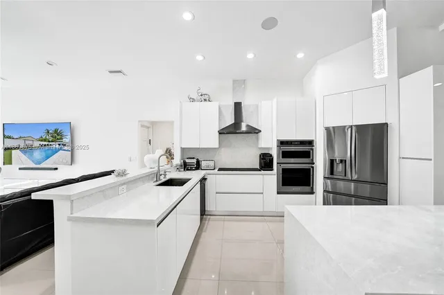 $850,000 | 1636 Southwest 108th Terrace, Davie, FL 33324