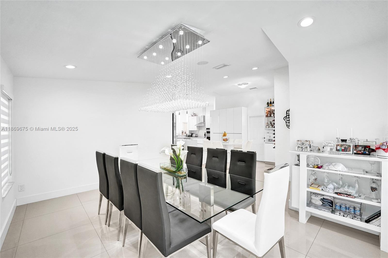 1636 Southwest 108th Terrace Davie, FL 33324 - Photo 8 of 92 a view of a dining room with furniture and wooden floor