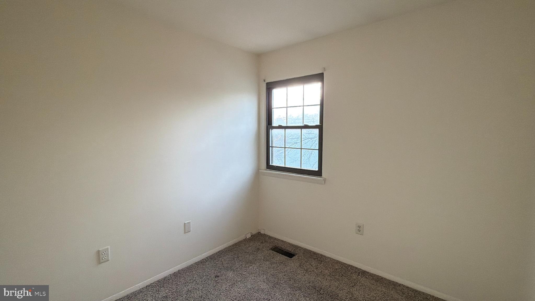 548 Lopax Road Harrisburg, PA 17112 - Photo 22 of 46 an empty room with windows