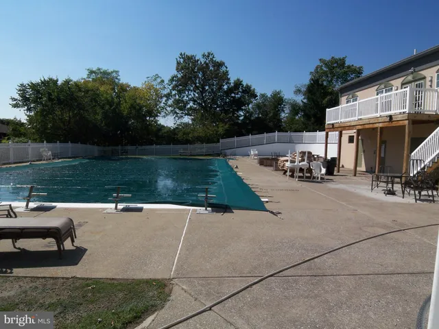 a room with gym equipment equipment and a window