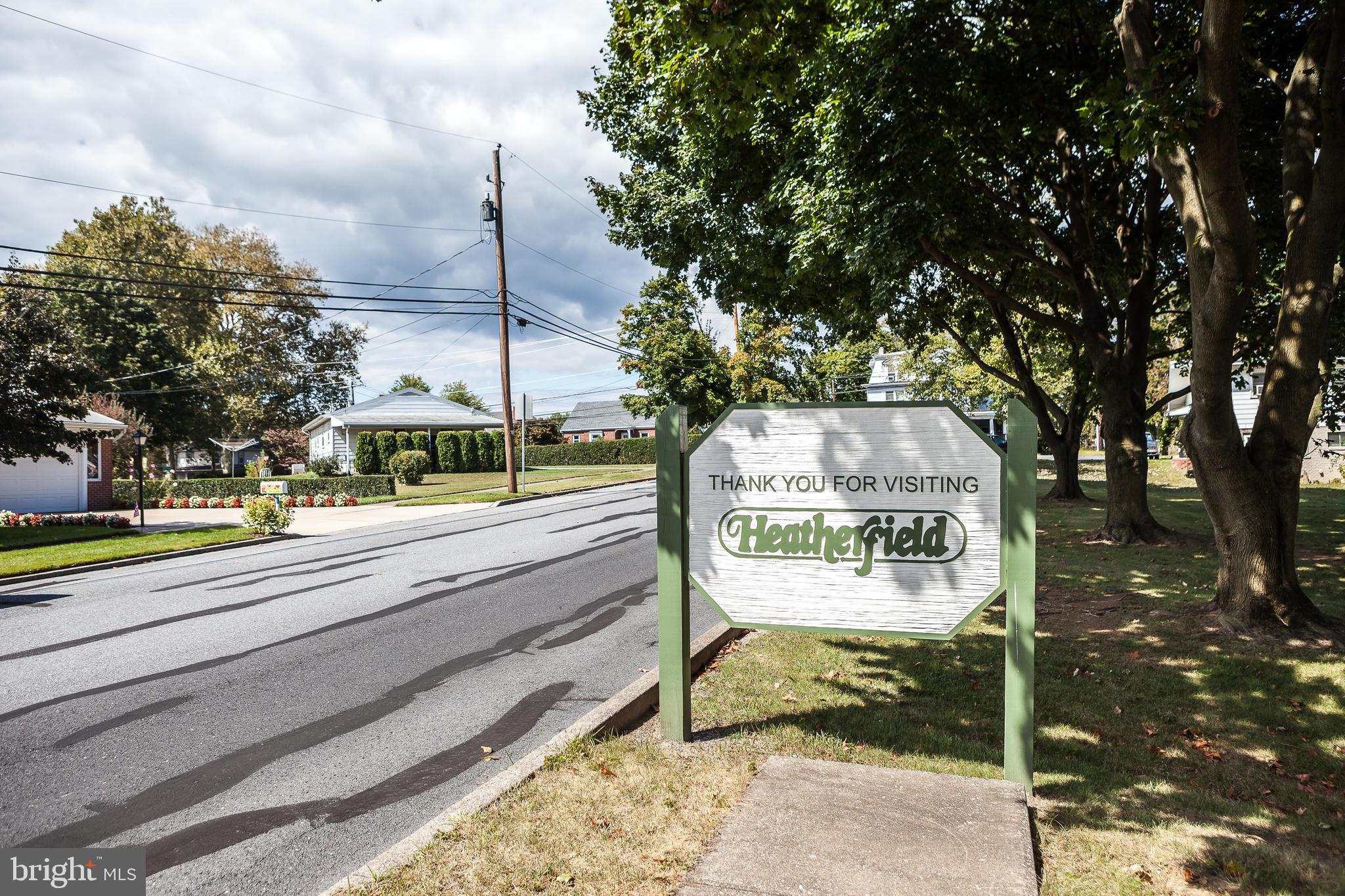 548 Lopax Road Harrisburg, PA 17112 - Photo 39 of 46 a view of a bench under a tree