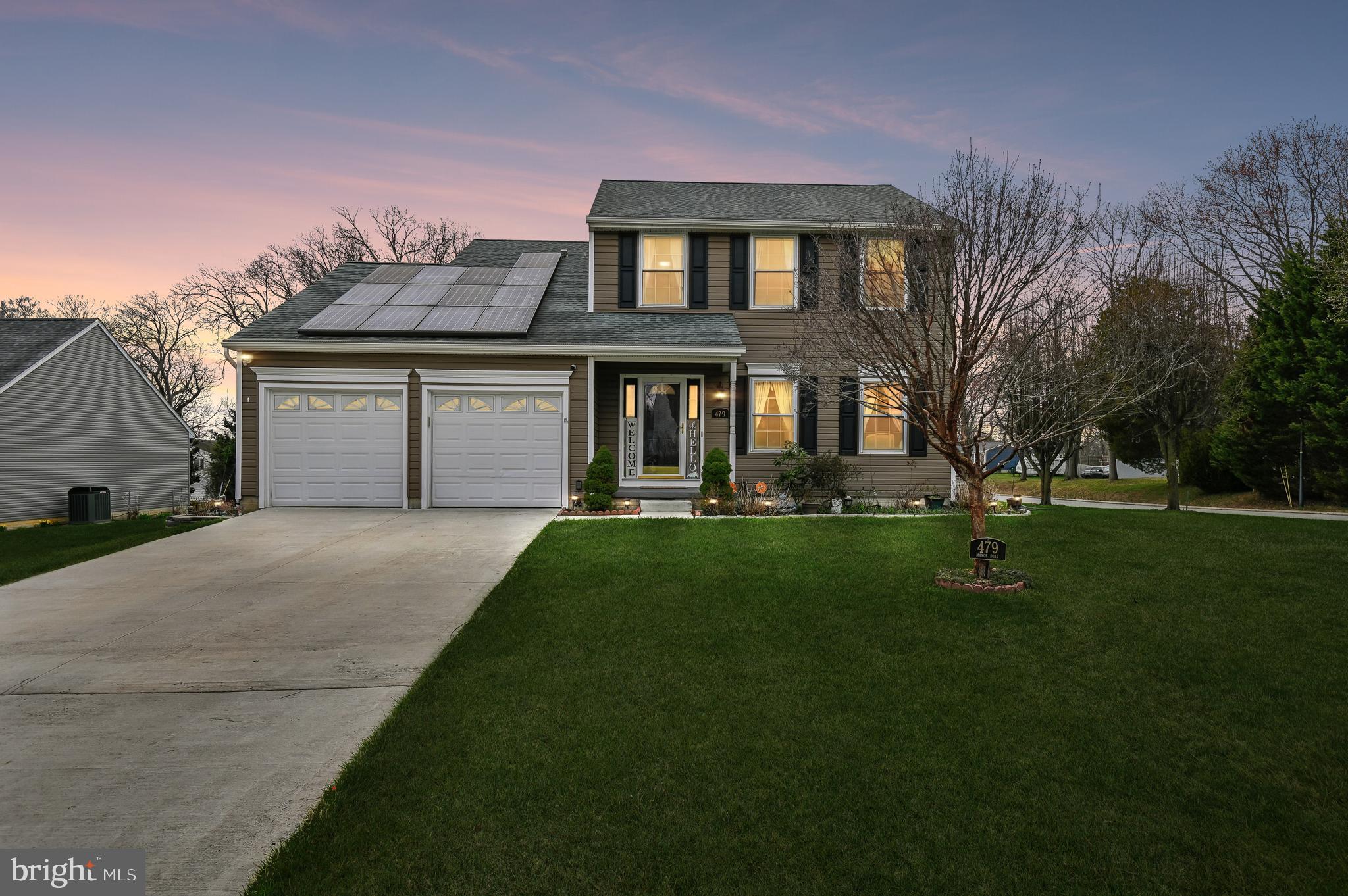 479 Manor Road Aberdeen, MD 21001 - Photo 1 of 36 a front view of a house with a garden and trees