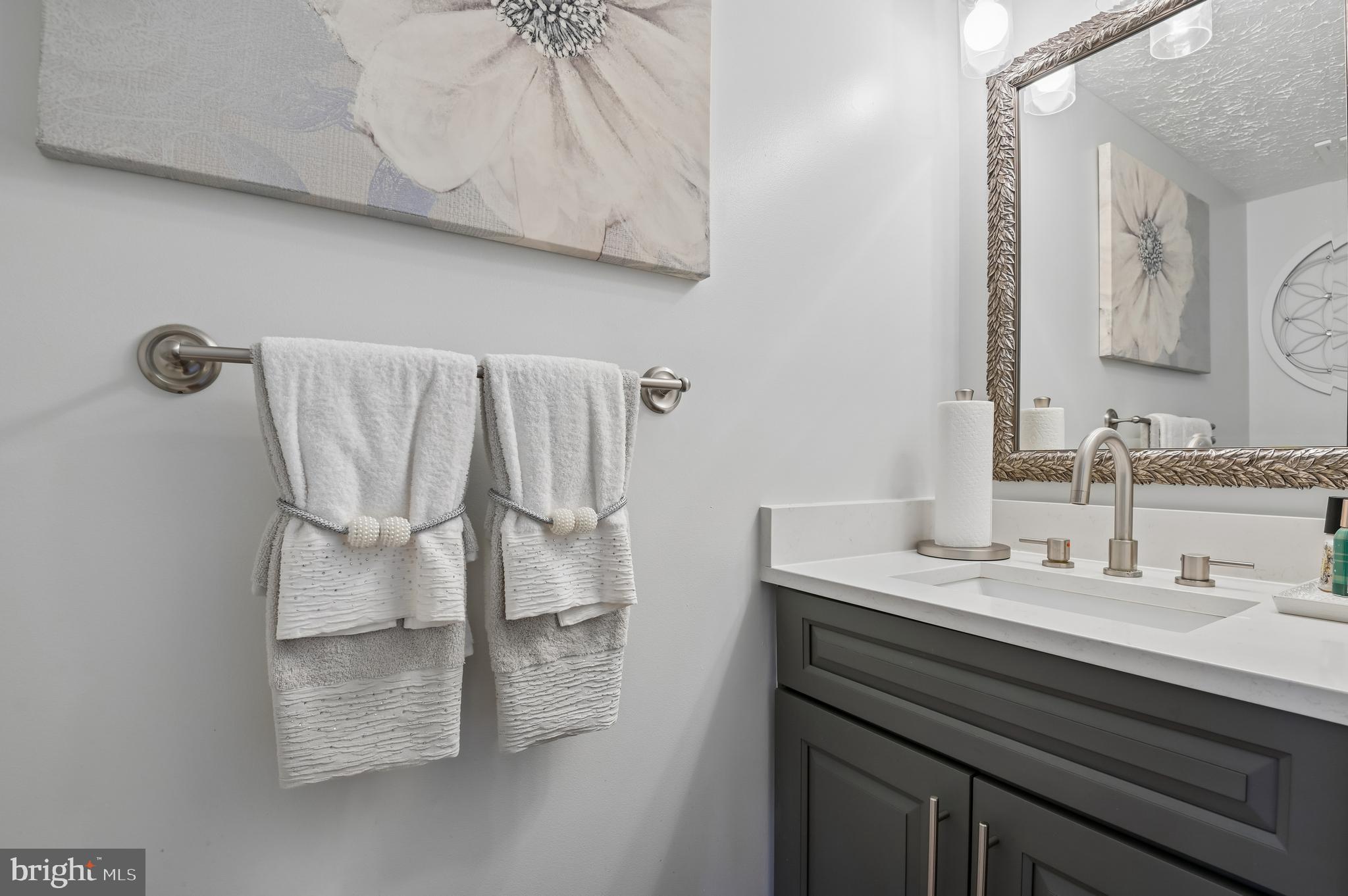 479 Manor Road Aberdeen, MD 21001 - Photo 16 of 36 a bathroom with a sink and a mirror
