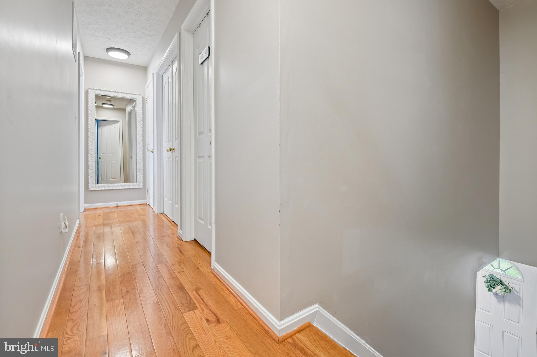 479 Manor Road Aberdeen, MD 21001 - Photo 17 of 36 a view of a hallway with wooden floor