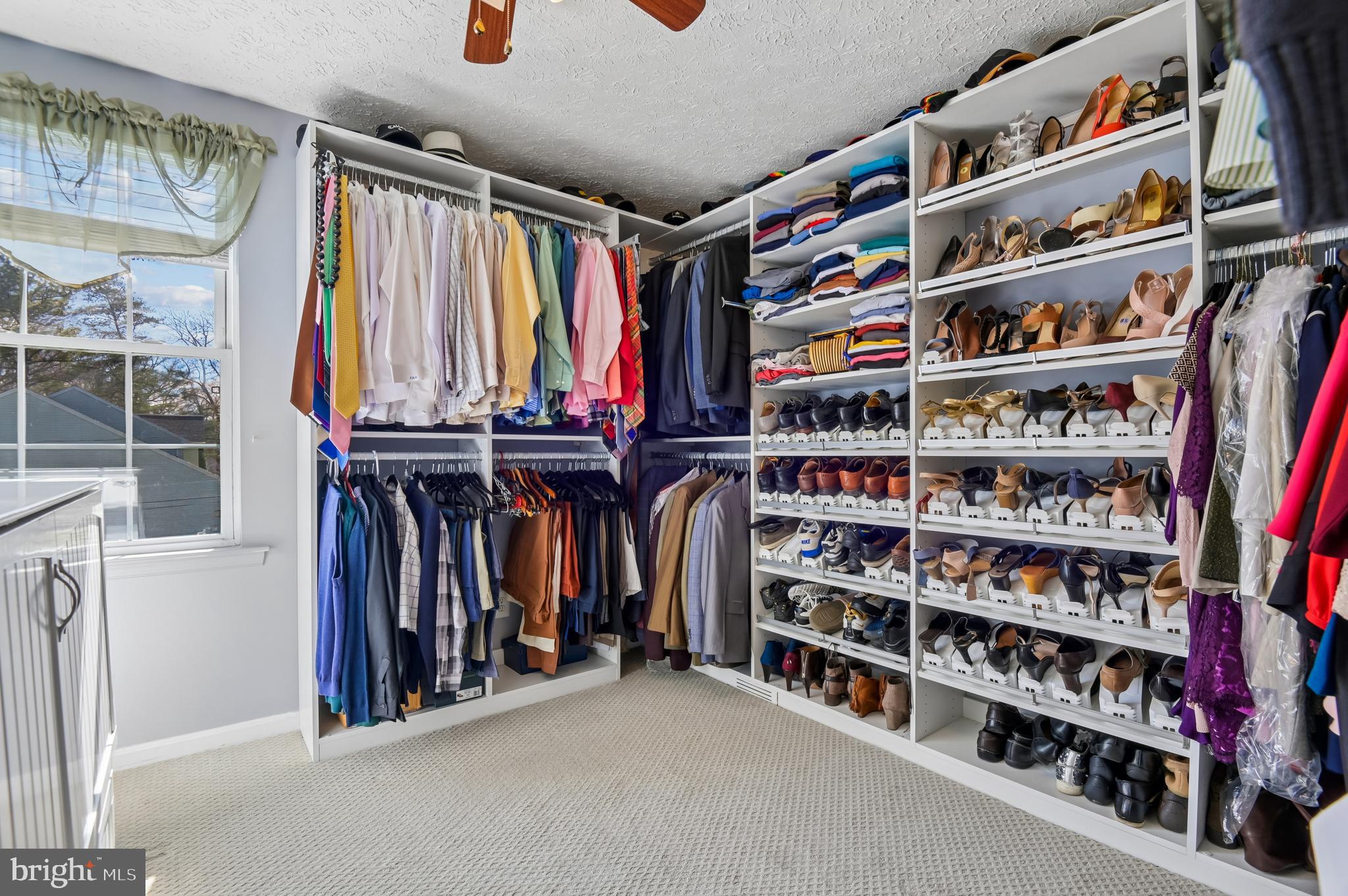479 Manor Road Aberdeen, MD 21001 - Photo 21 of 36 a view of walk in closet with clothes and shoes