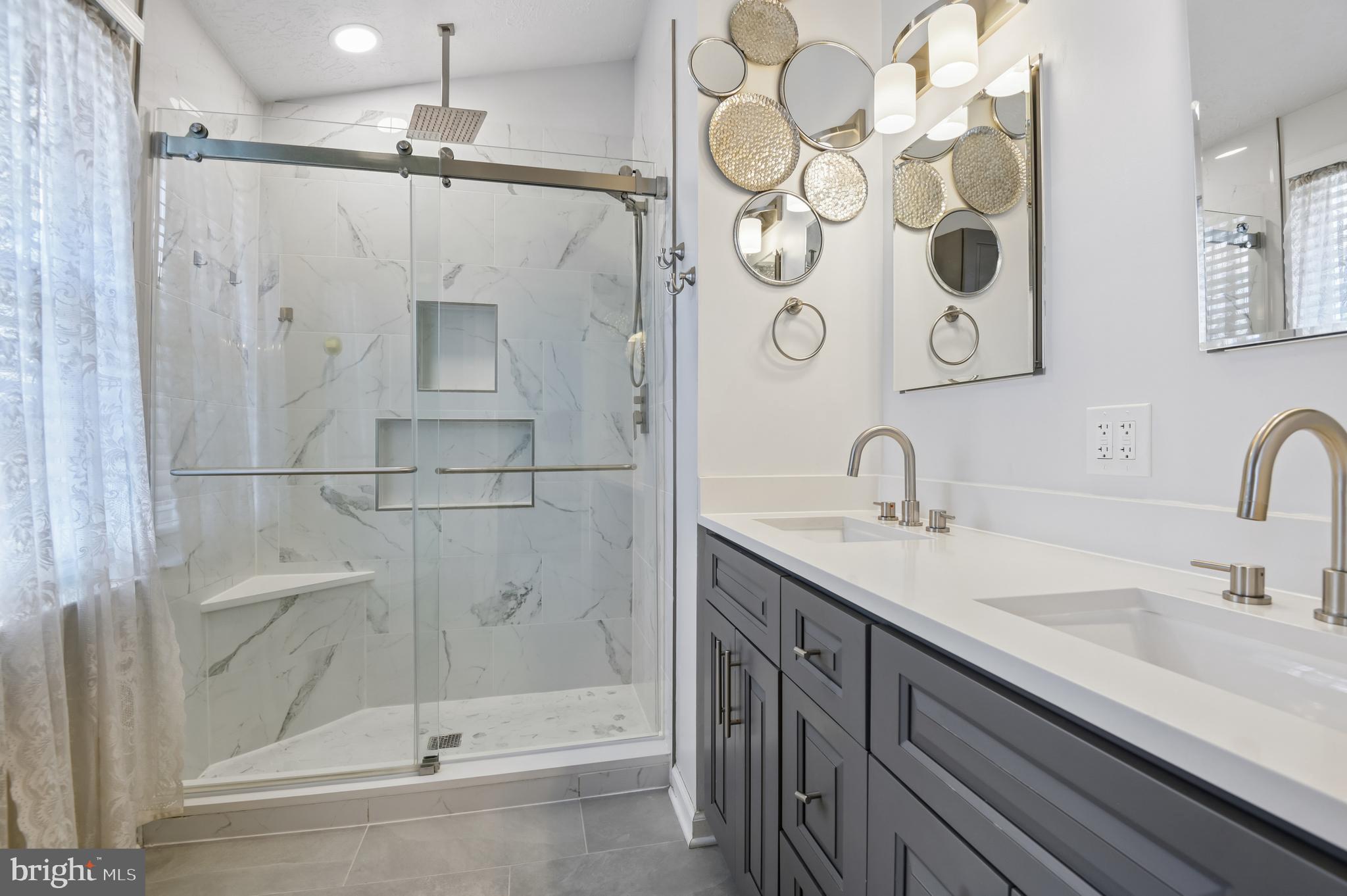 479 Manor Road Aberdeen, MD 21001 - Photo 22 of 36 a bathroom with a sink and a mirror