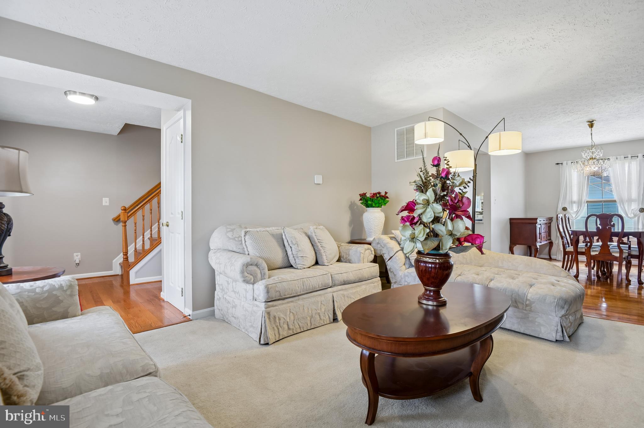 479 Manor Road Aberdeen, MD 21001 - Photo 5 of 36 a living room with furniture and a chandelier