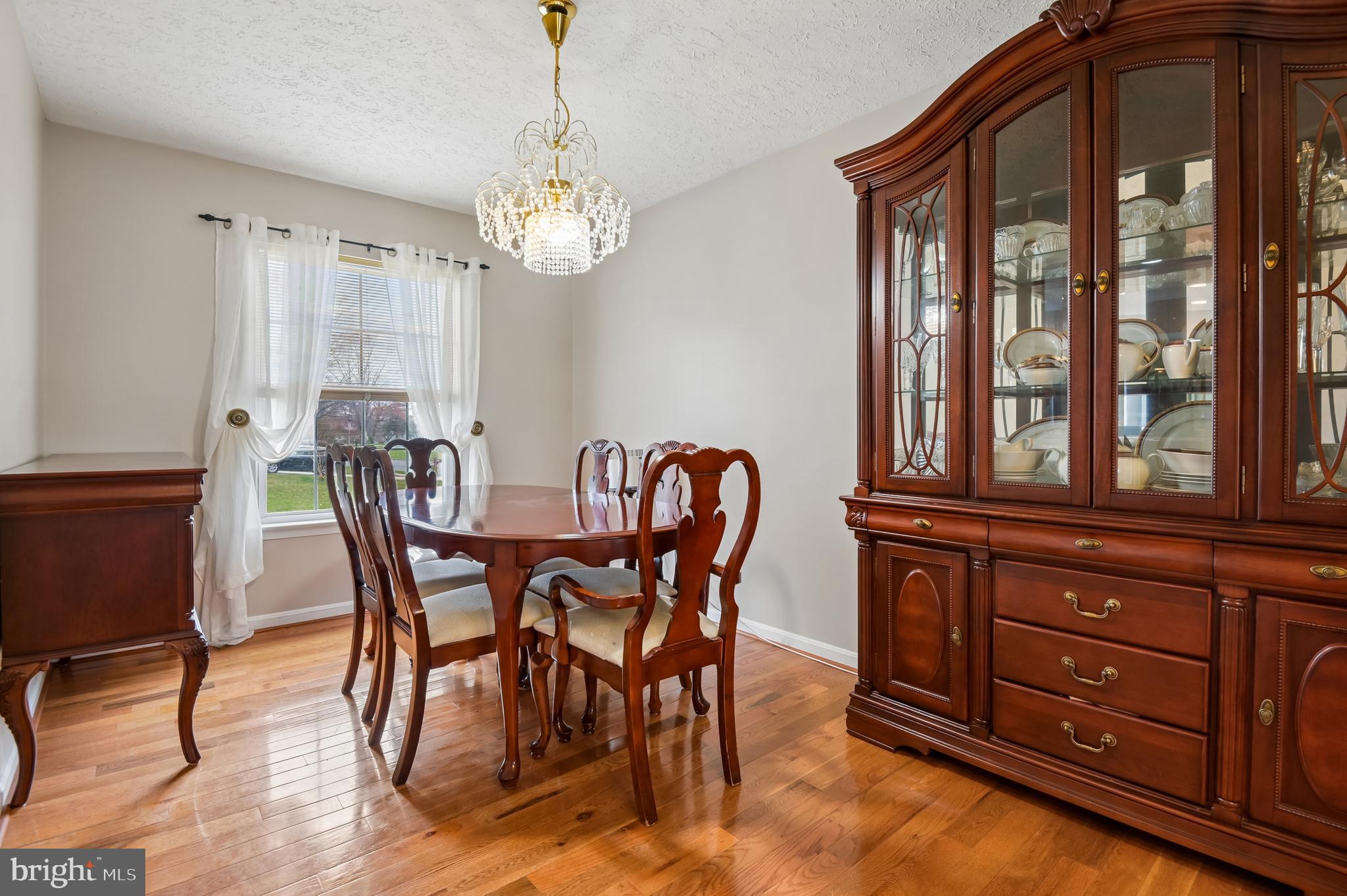 479 Manor Road Aberdeen, MD 21001 - Photo 7 of 36 a view of a dining room with furniture window and wooden floor
