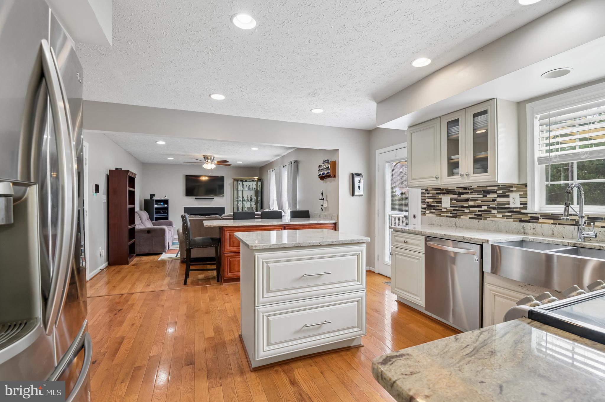 479 Manor Road Aberdeen, MD 21001 - Photo 10 of 36 a kitchen with stainless steel appliances granite countertop a refrigerator and a stove top oven