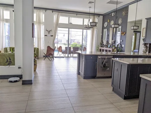 a lobby with furniture and floor to ceiling window