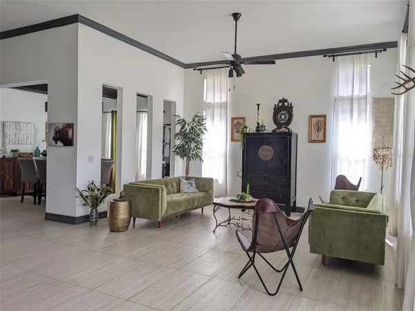 a living room with furniture and a window