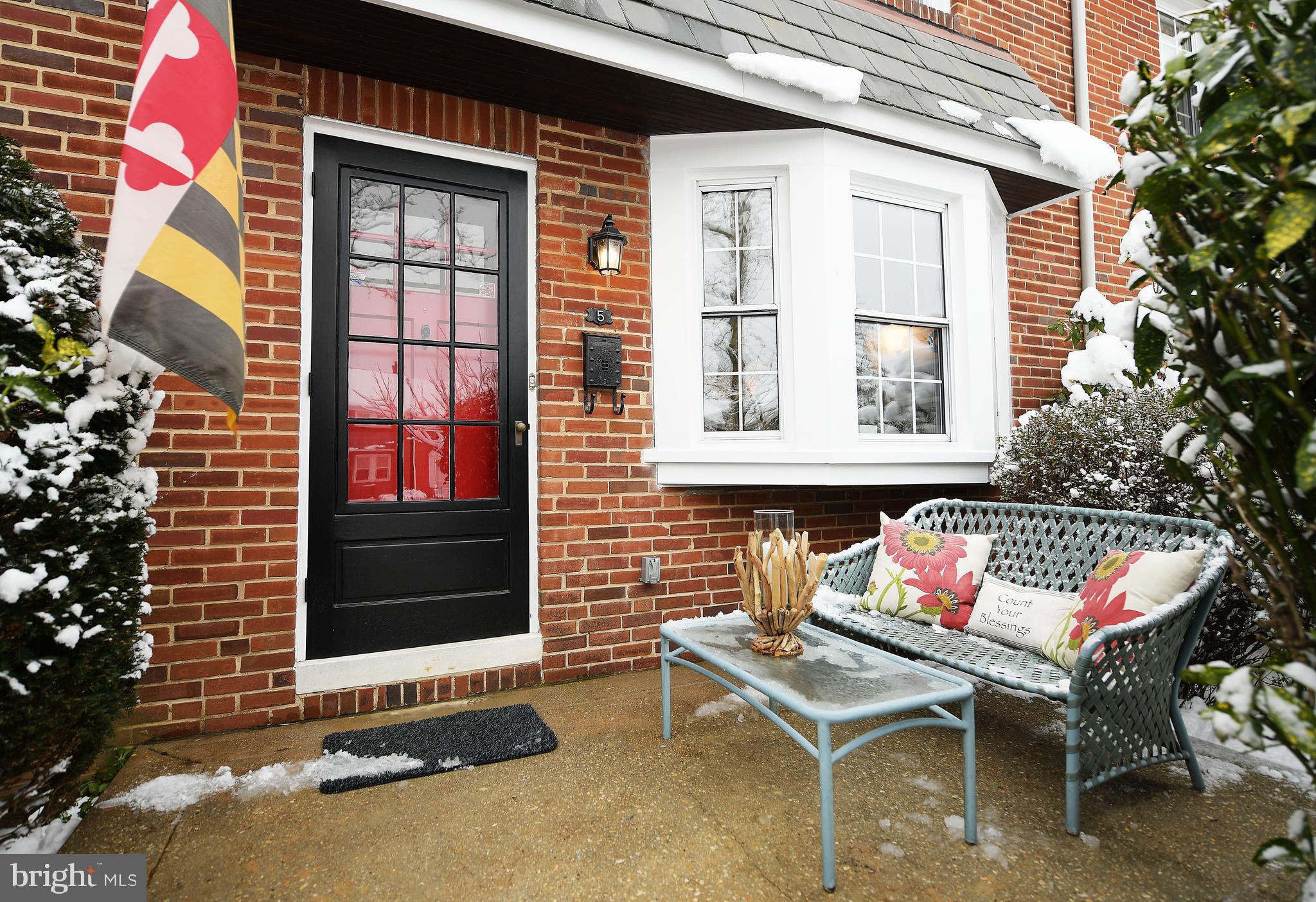 5 Murdock Road Baltimore, MD 21212 - Photo 1 of 48 a building outdoor space with patio furniture and potted plants