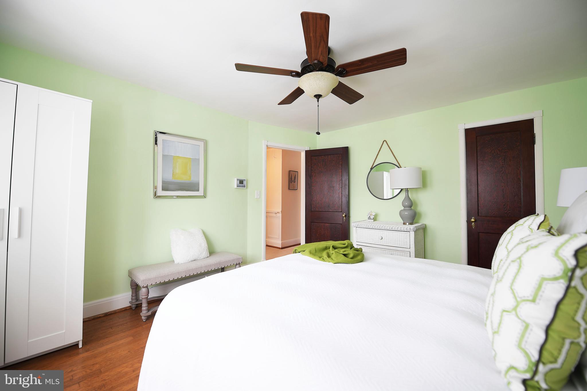 5 Murdock Road Baltimore, MD 21212 - Photo 24 of 48 a bedroom with a bed and wooden floor