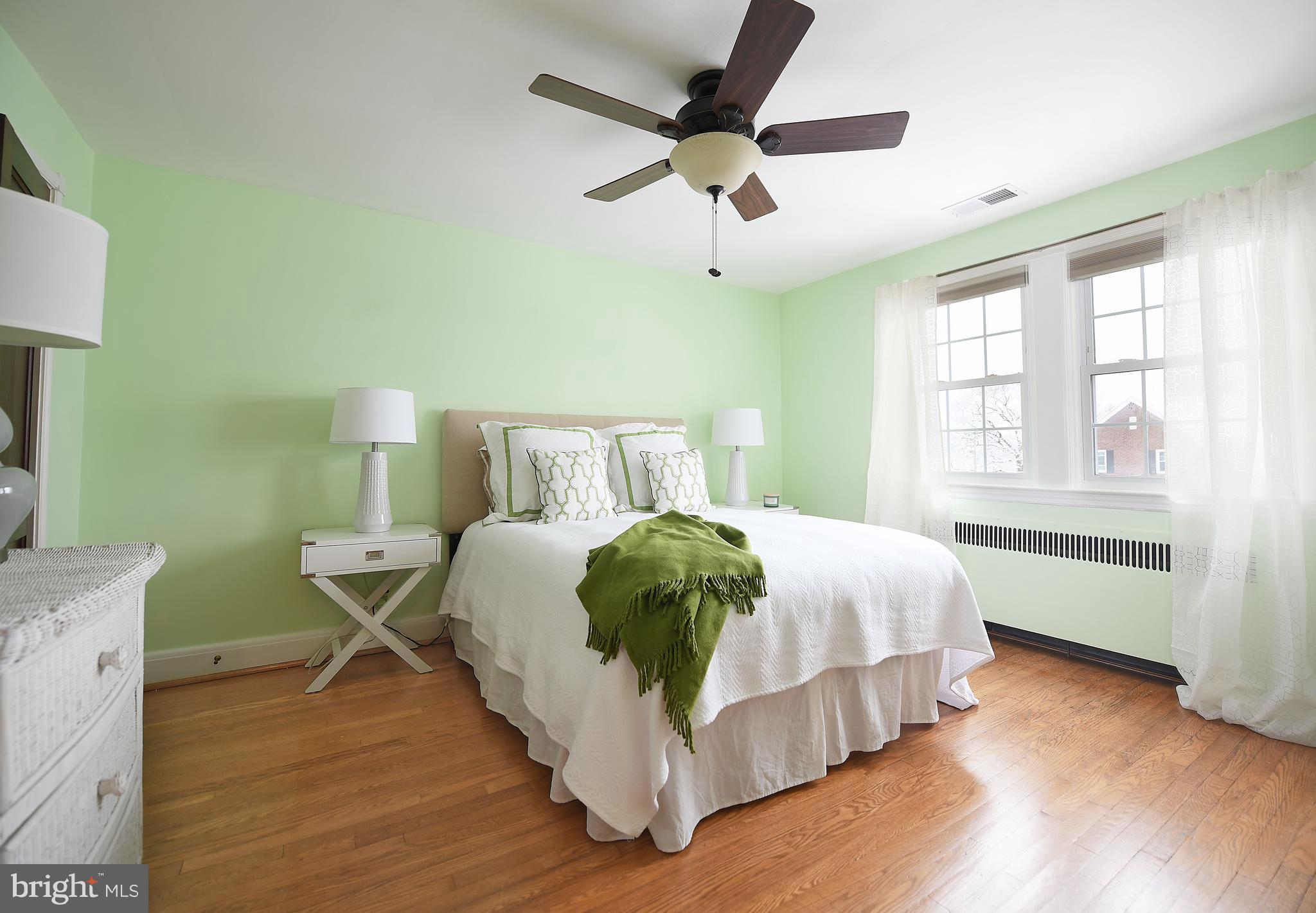 5 Murdock Road Baltimore, MD 21212 - Photo 25 of 48 a bedroom with a bed and wooden floor