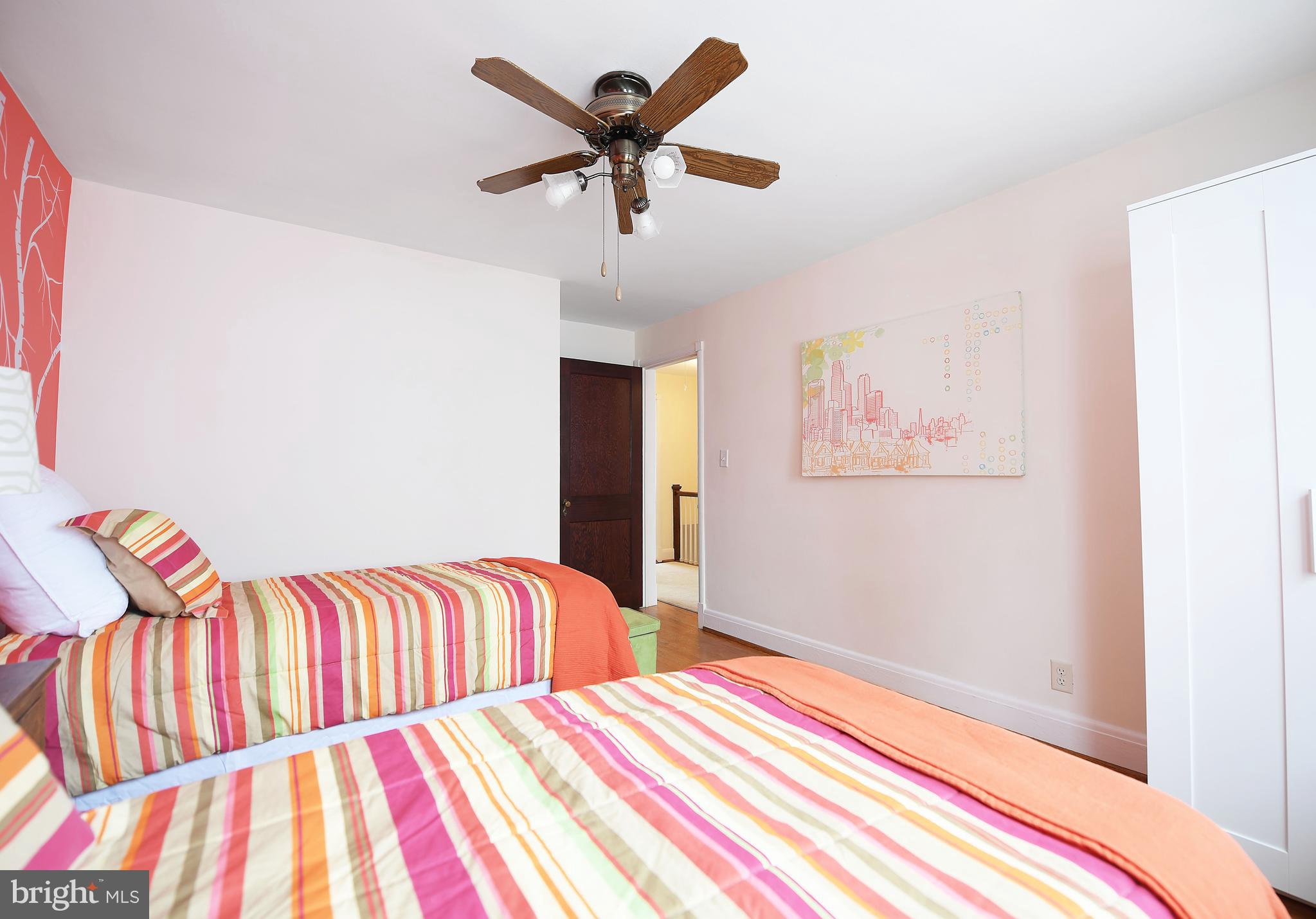 5 Murdock Road Baltimore, MD 21212 - Photo 28 of 48 a bedroom with a bed and painting on the wall