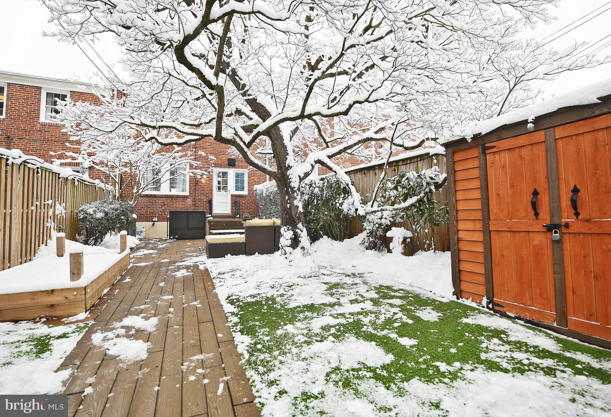 5 Murdock Road Baltimore, MD 21212 - Photo 42 of 48 a view of a backyard with snow on the road