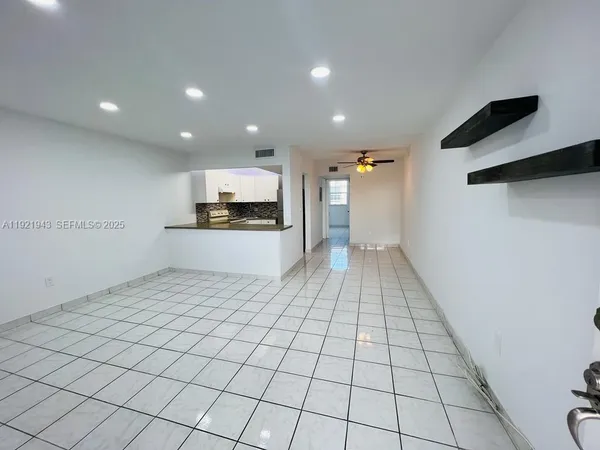 a view of kitchen and hall with furniture