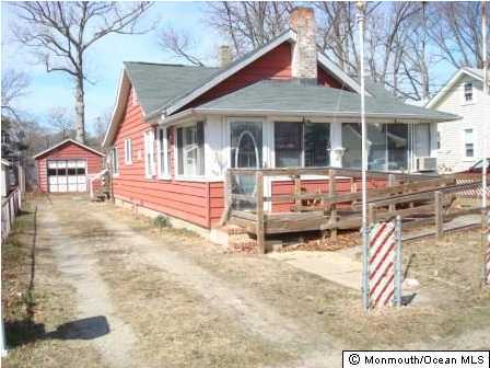 116 Bash Road Toms River, NJ 08753 - Photo 1 of 3 a backyard of a house with seating space
