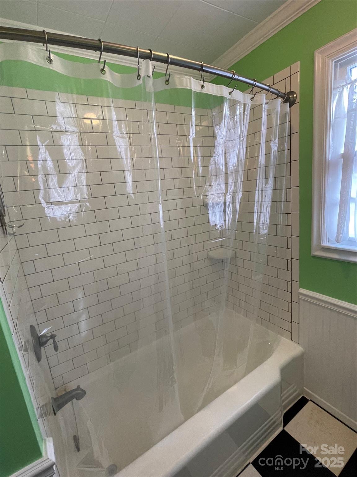 2711 Mooresville Road Salisbury, NC 28147 - Photo 12 of 18 a bathroom with a shower and a bathtub