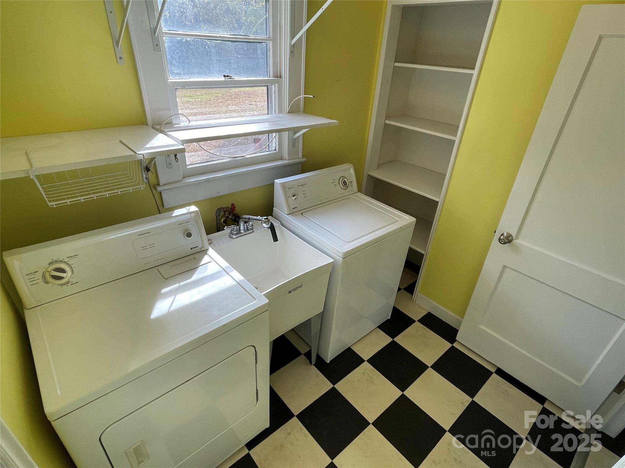 2711 Mooresville Road Salisbury, NC 28147 - Photo 15 of 18 a utility room with dryer and washer