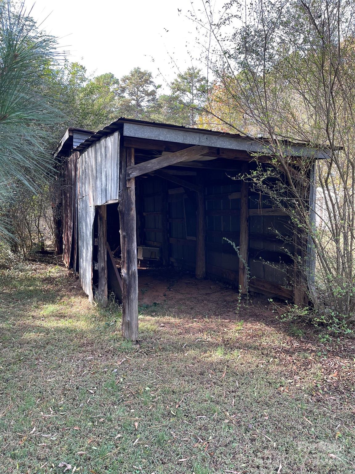 2711 Mooresville Road Salisbury, NC 28147 - Photo 17 of 18 a view of a small barn