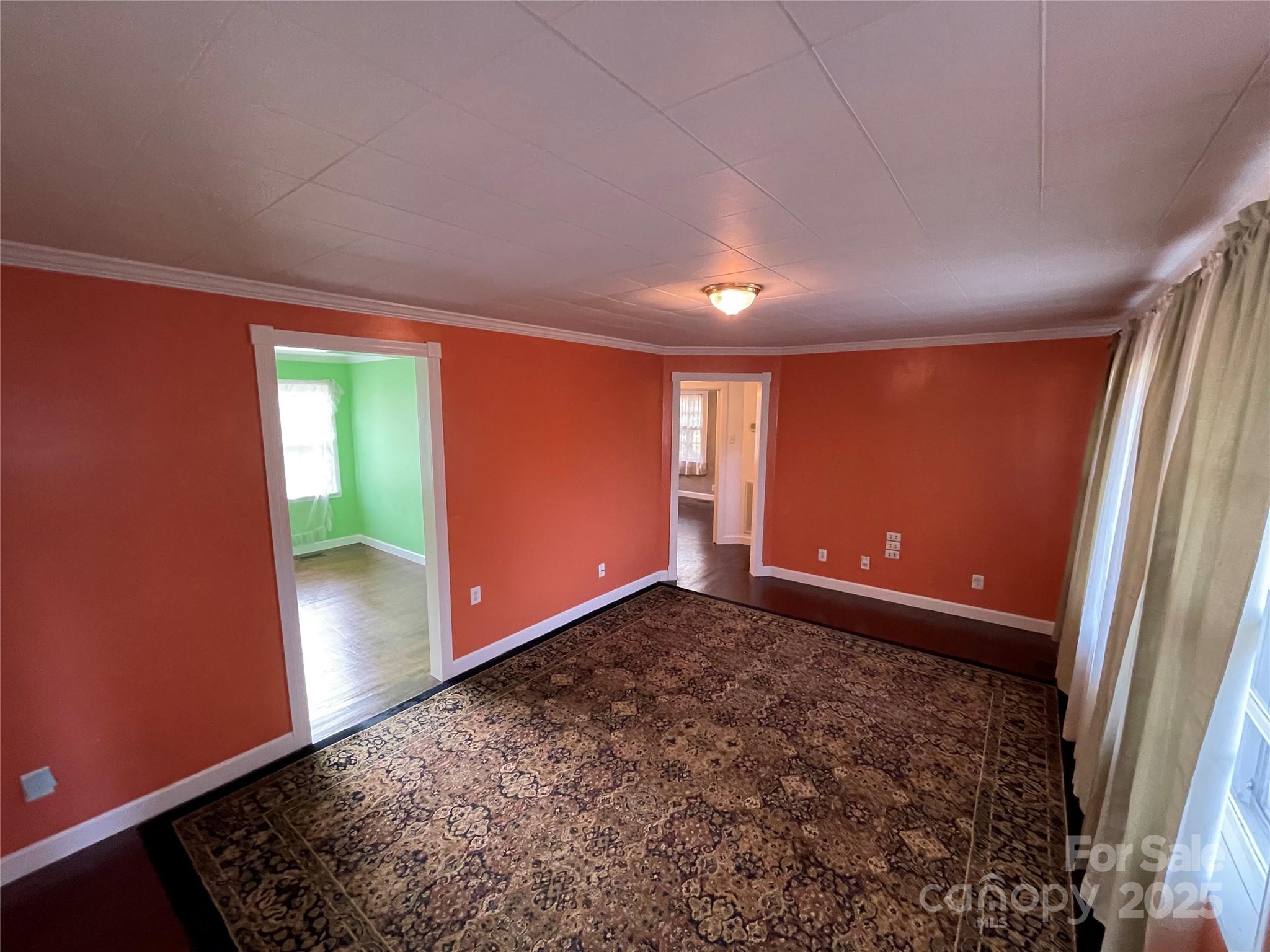 2711 Mooresville Road Salisbury, NC 28147 - Photo 2 of 18 an empty room with windows
